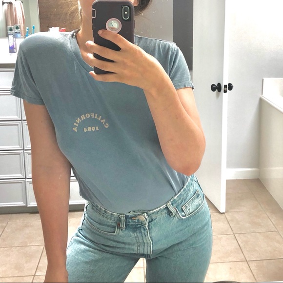Brandy Melville Tops - ‘California 1984’ Brandy Melville Blue Top